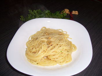 Spaghetti with garlic chilli pepper and English Walnuts